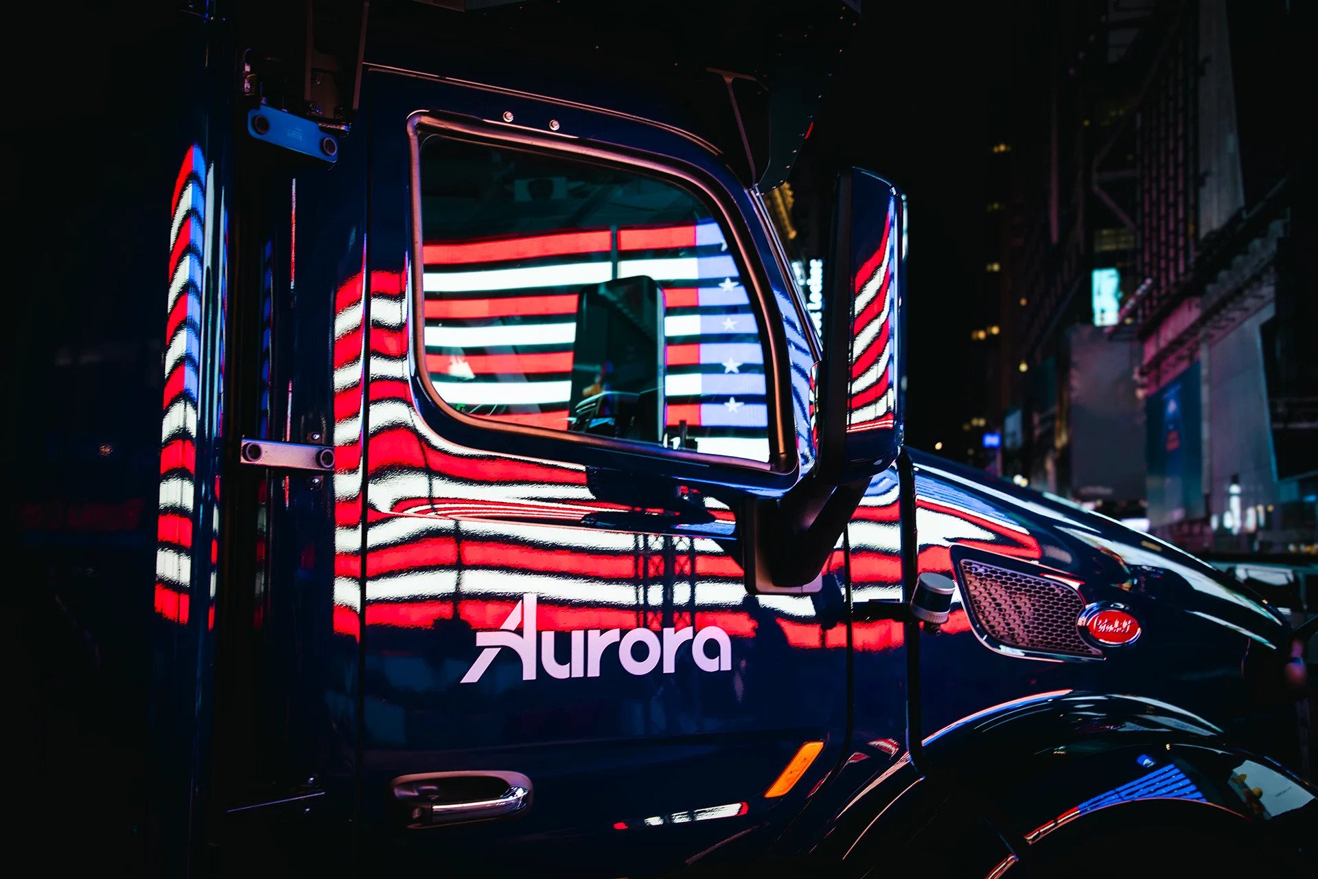 Aurora self-driving trucks at night
